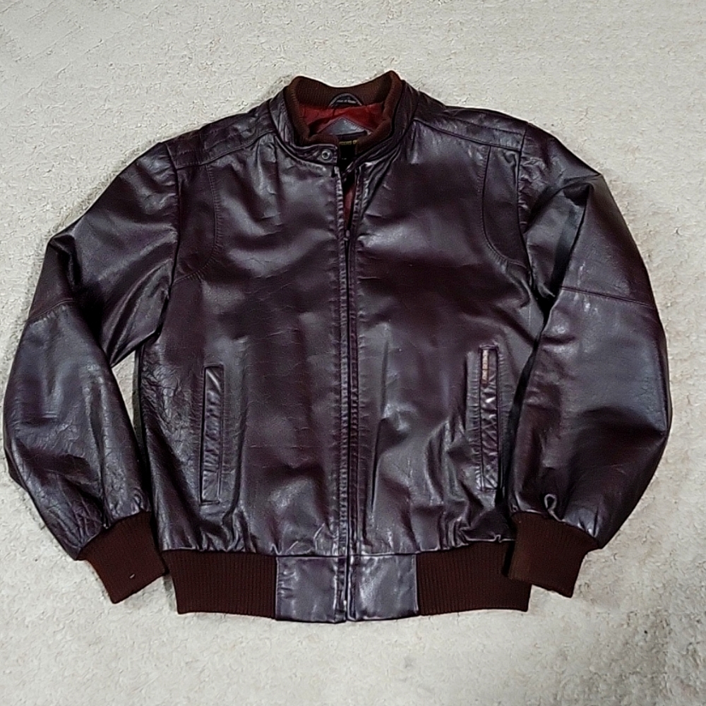 Members Only Leather Jacket, Size 38. Dark red brown color